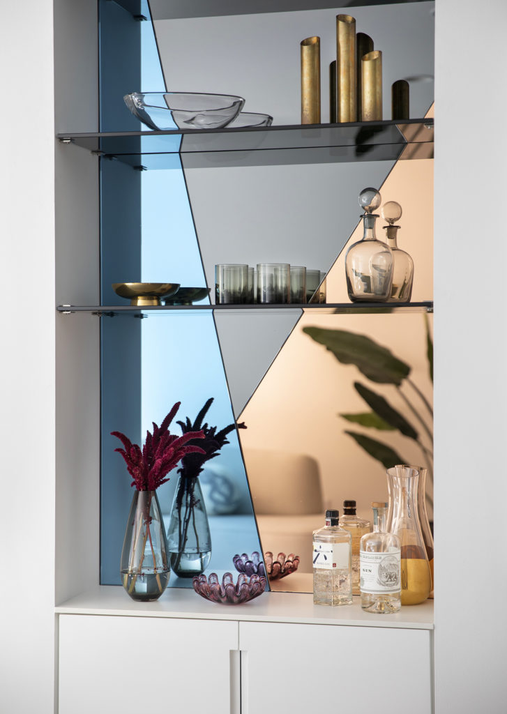 Custom geometric mirrors and built-in bar